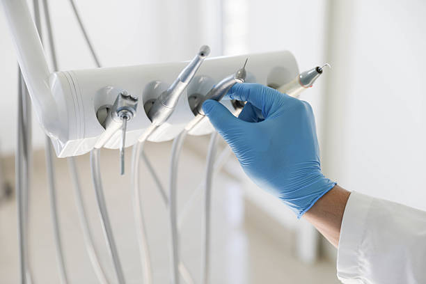 Professional Invisalign Clear Aligners technician working in Pine Island Center, FL